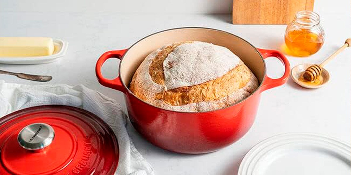 Le Creuset Round Dutch Oven with loaf of bread inside Le Creuset Round Dutch Oven with loaf of bread inside