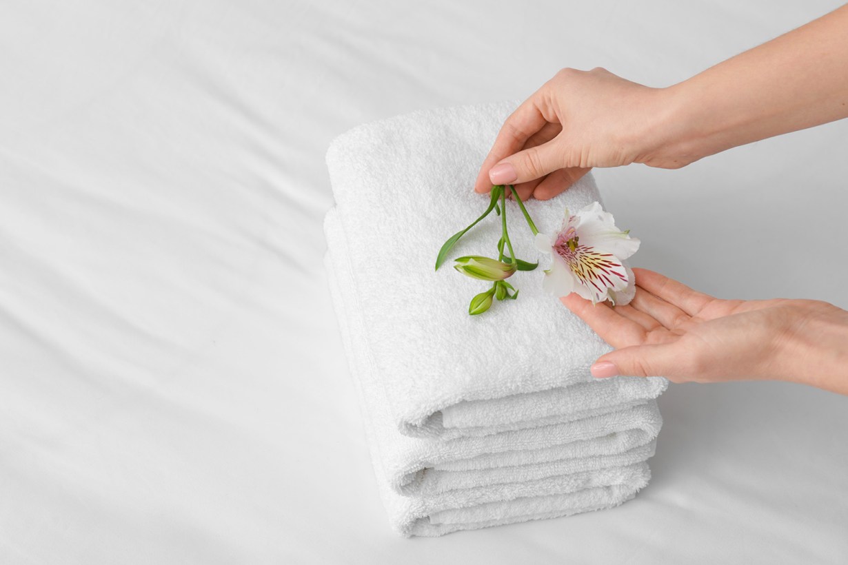hands drying on towel
