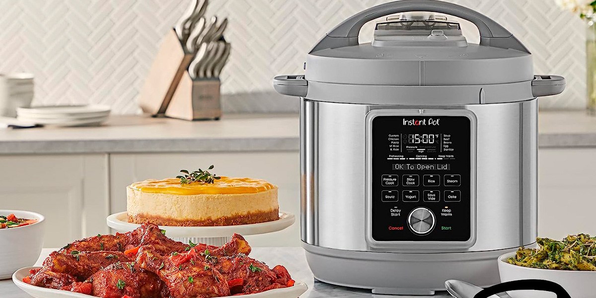 Instant Pot Duo Plus on kitchen counter surrounded by cooked foods