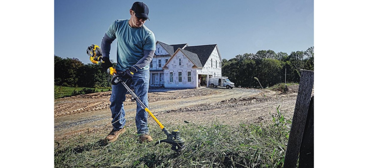 Person using DeWalt Flexvolt 60V Max String Trimmer
