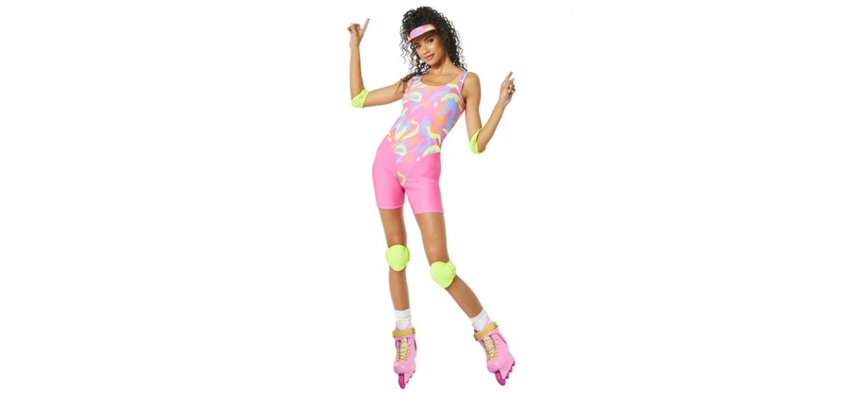 Woman wearing Rollerblade Barbie costume on white background
