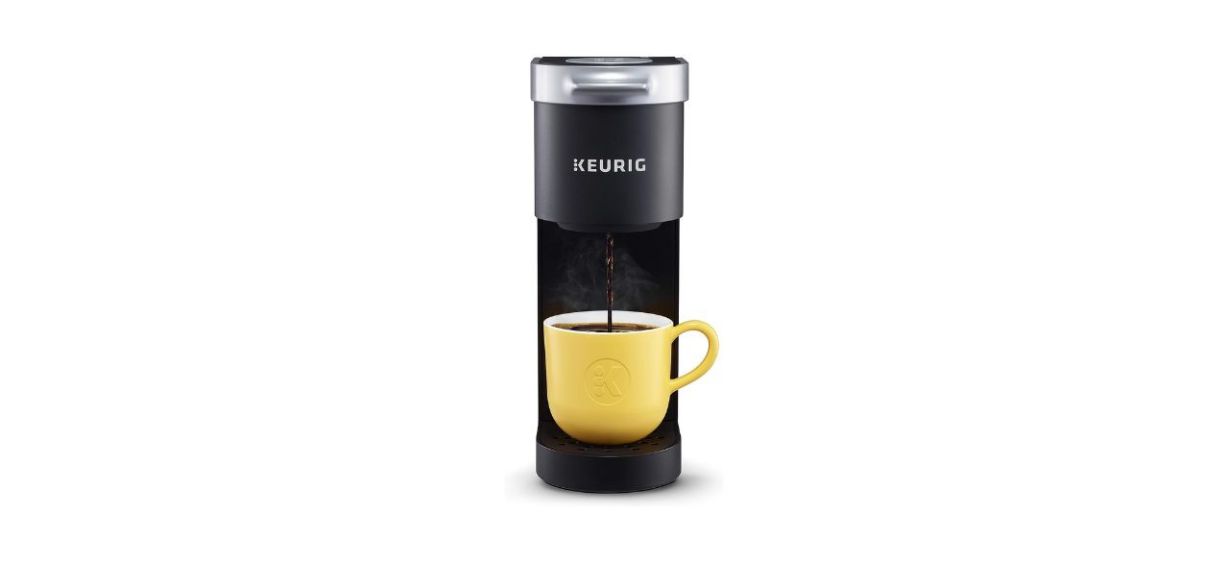 Keurig K Mini Single Serve Coffee Maker with a yellow mug beneath it