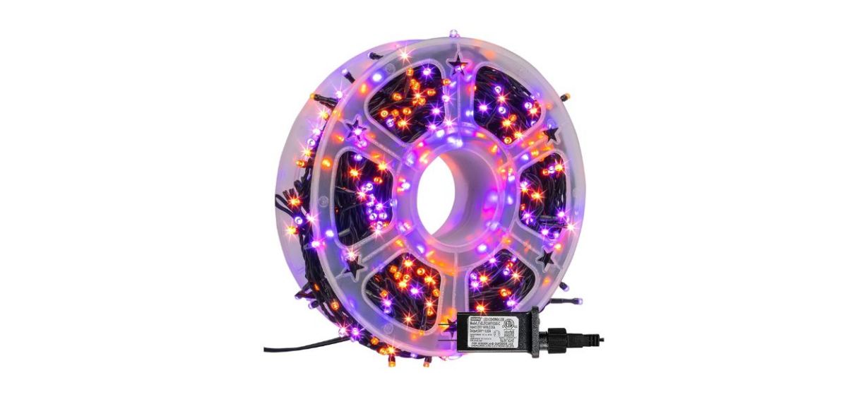 A roll of purple and orange string lights
