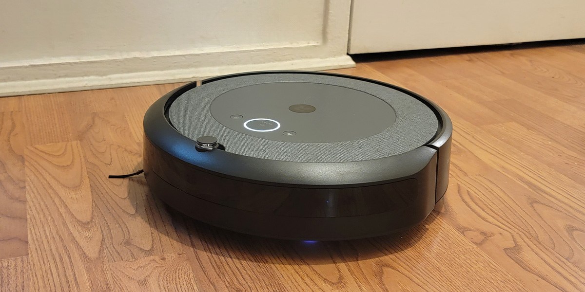 Roomba i3+ EVO cleaning hardwood flooring.